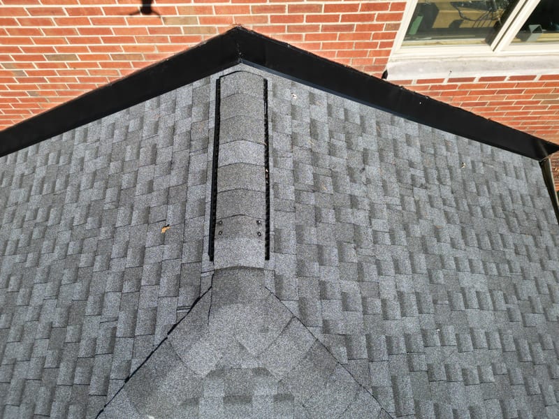 Close detail of the finished hip and ridge vent run on the completed roof