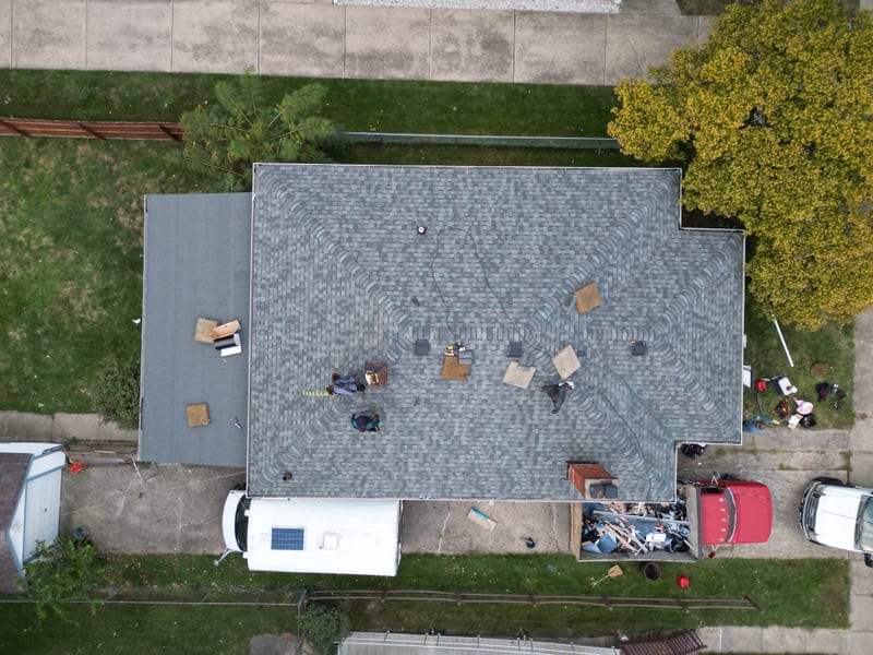 Straight-down view of the completed roof, framed to match the bare-deck shot for a direct comparison
