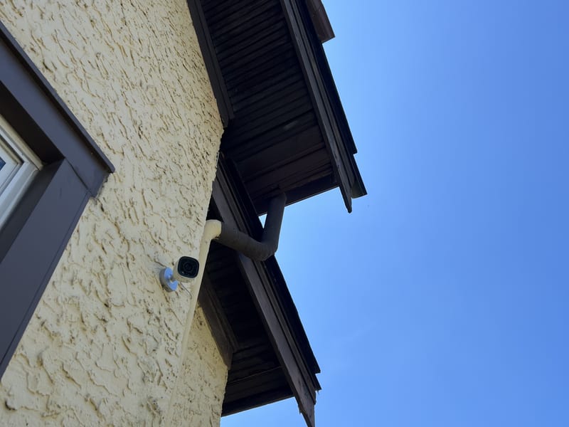 The same corner of the overhang repaired, new boards in and painted to match